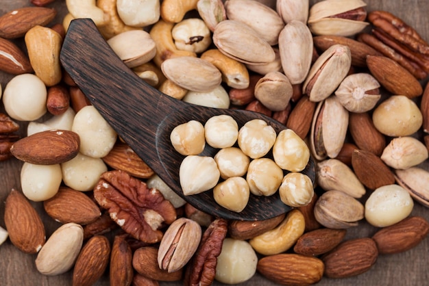 Varias nueces orgánicas snack y fondo de cuchara