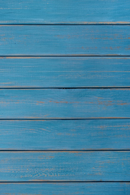 Vertical de madera azul de la playa del verano del fondo