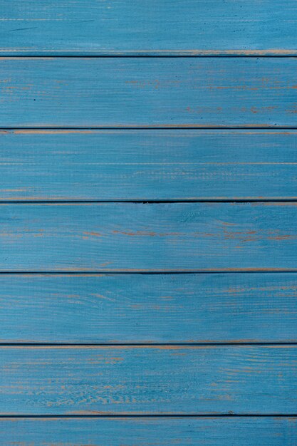 Vertical de madera azul de la playa del verano del fondo