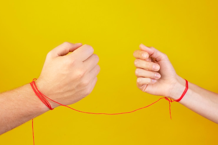 Foto gratuito vida muerta de conexión de hilo rojo