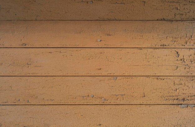 Vieja textura de madera pintada agrietada