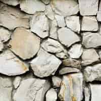 Foto gratuita viejo fondo de textura de pared de piedra de grandes rocas