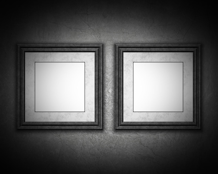 Foto gratuito viejos marcos de fotos en blanco en una pared de estilo grunge