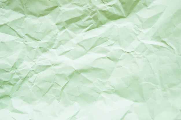 Vista de alto ángulo de papel con textura de fondo verde