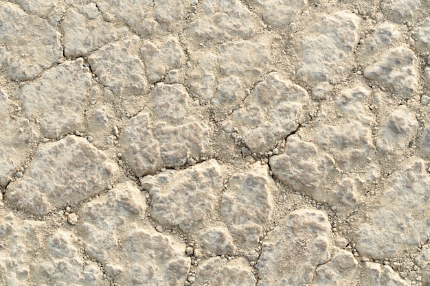 Foto gratuita vista anterior de suelo seco blanco con pequeñas piedras. concepto de estructura superficial de la piedra.