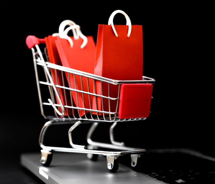 Foto gratuito vista frontal de las bolsas de la compra en el carro para el cyber monday