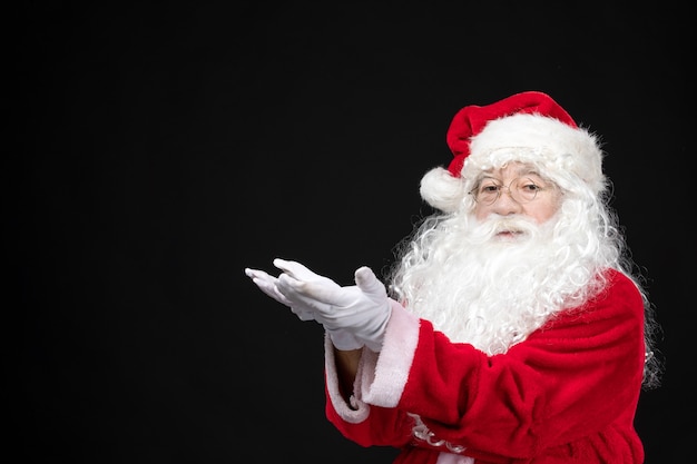 Foto gratuita vista frontal de santa claus en traje rojo clásico