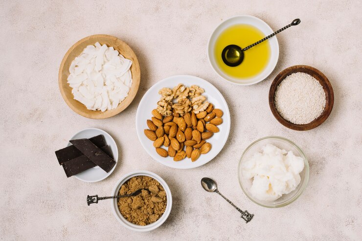 Foto gratuito vista superior aperitivos nutritivos con coco y aceite de oliva