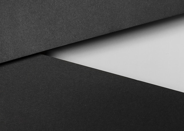 Vista superior de capas de papel blanco y negro