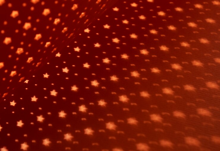 Foto gratuito vista superior chapa microperforada con fondo naranja
