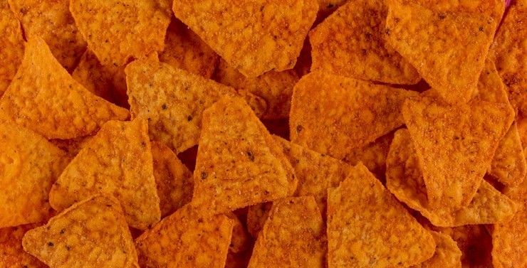 Foto gratuito vista superior chips textura horizontal