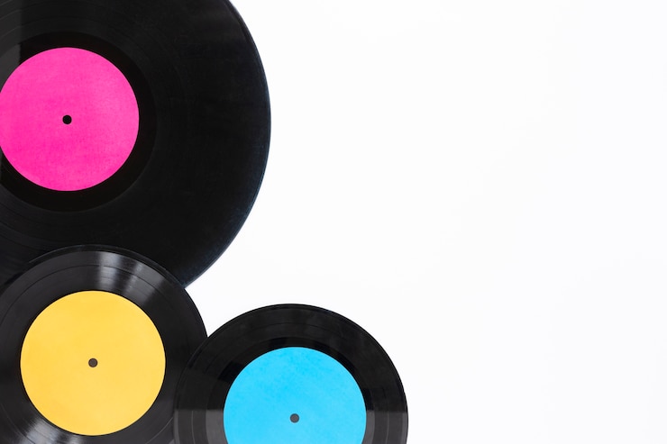 Foto gratuito vista superior de discos de vinilo con espacio de copia