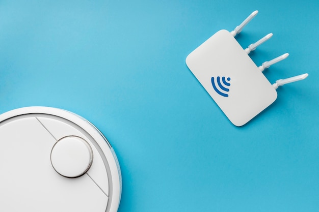 Vista superior del enrutador wi-fi con aspiradora