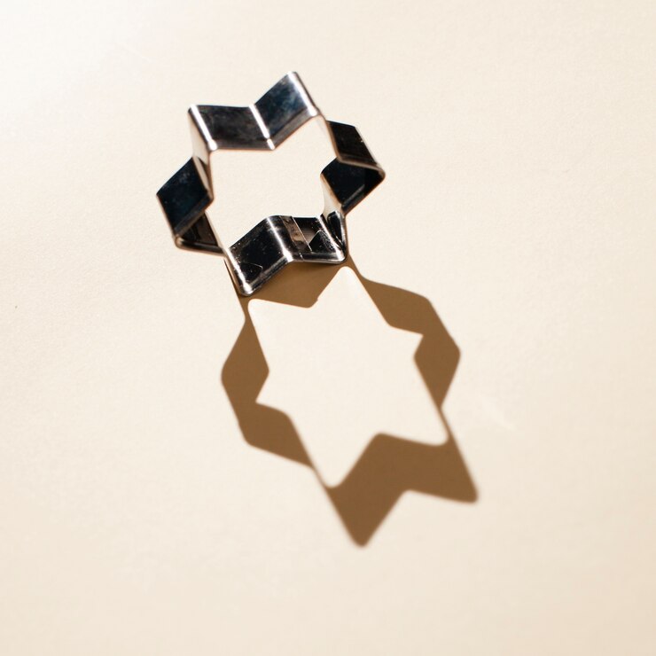 Foto gratuito vista superior de forma de estrella con sombra