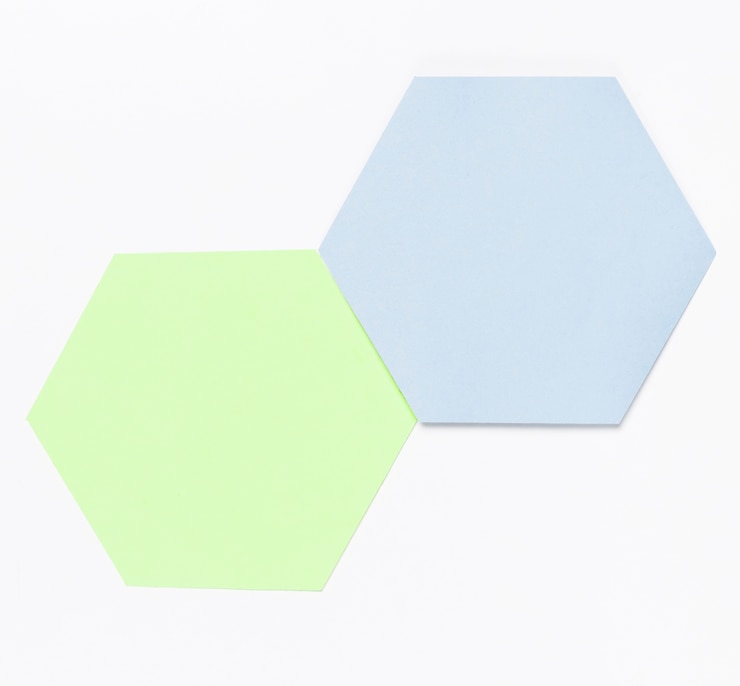 Foto gratuito vista superior hexágono de papel de colores