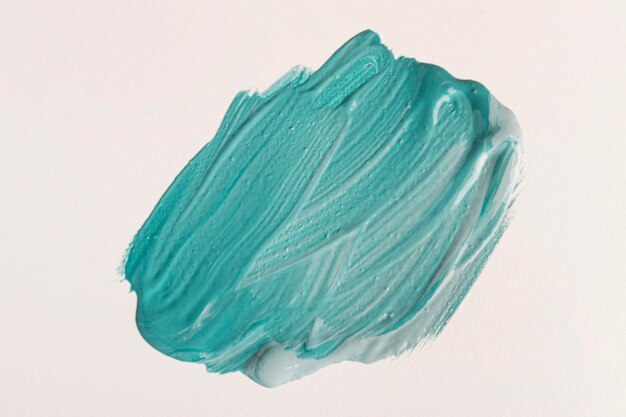 Vista superior de pintura azul con pinceladas