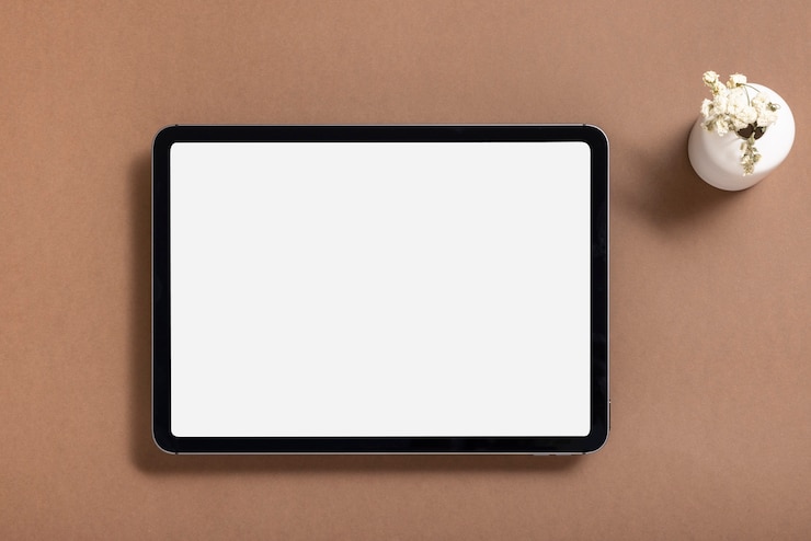 Foto gratuito vista superior de la tableta con pantalla mínima