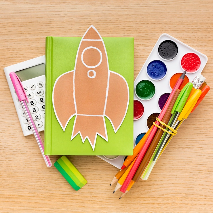Foto gratuito vista superior de útiles escolares de regreso a la escuela con lápices y libros