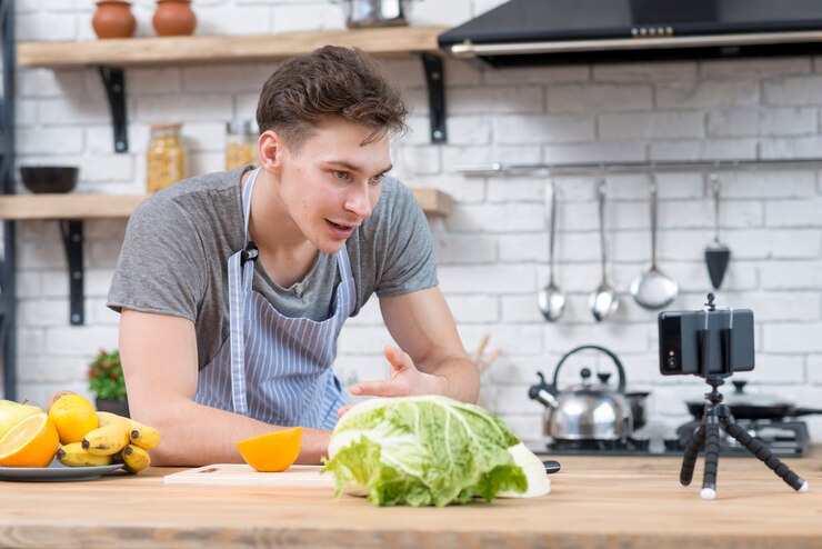 Foto gratuito vlogger de cocina