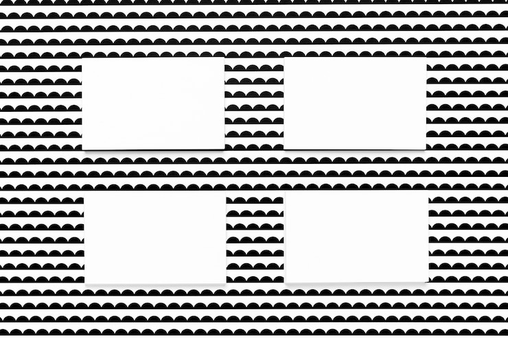 Photo Gratis white cards on patterned background