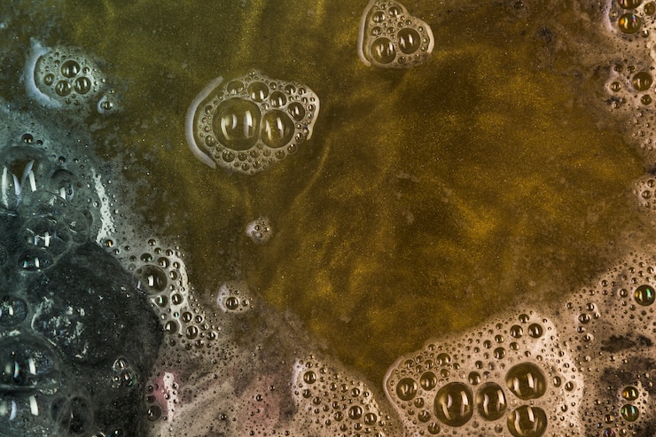 Foto gratuito acqua gialla con le bollicine