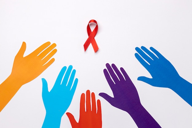Assortimento di concetti per la giornata mondiale dell'aids con il simbolo del nastro