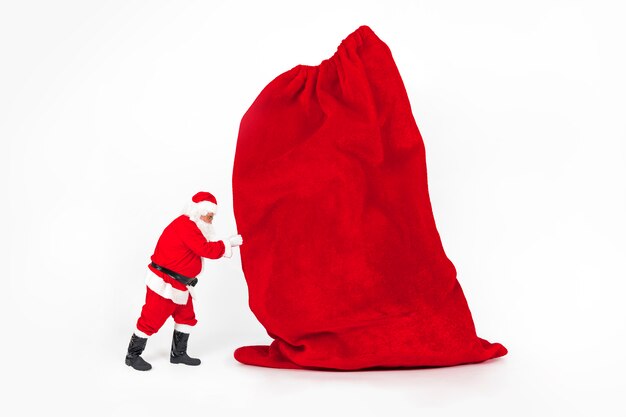 Babbo Natale che tiene la borsa di Natale gigante