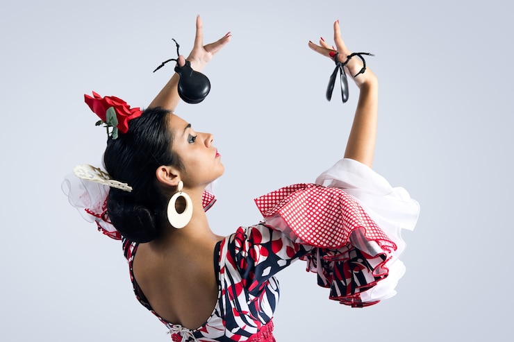 Foto gratuito ballerina di flamenco in un bellissimo vestito