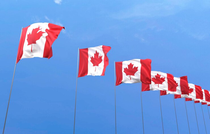 Foto gratuito bandiera del canada su sfondo blu