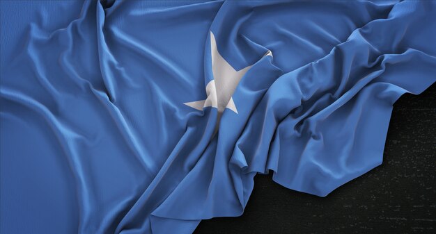 Bandiera della Somalia rugosa su sfondo scuro 3D Rendering