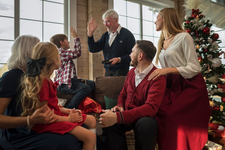 Foto gratuito bella famiglia che si gode il natale insieme a casa