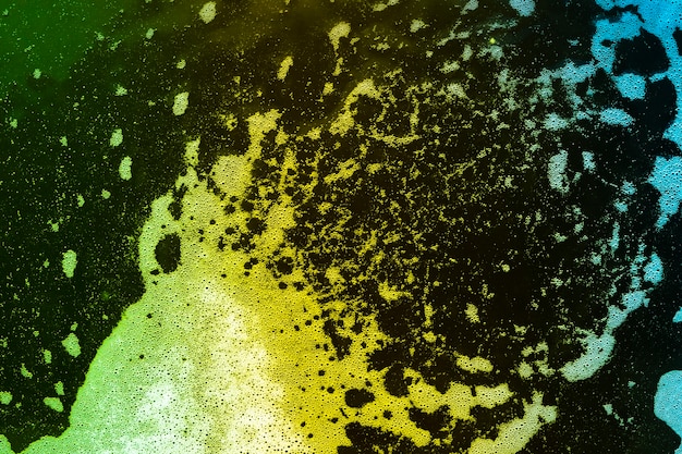 Bolle su liquido colorato sfumato