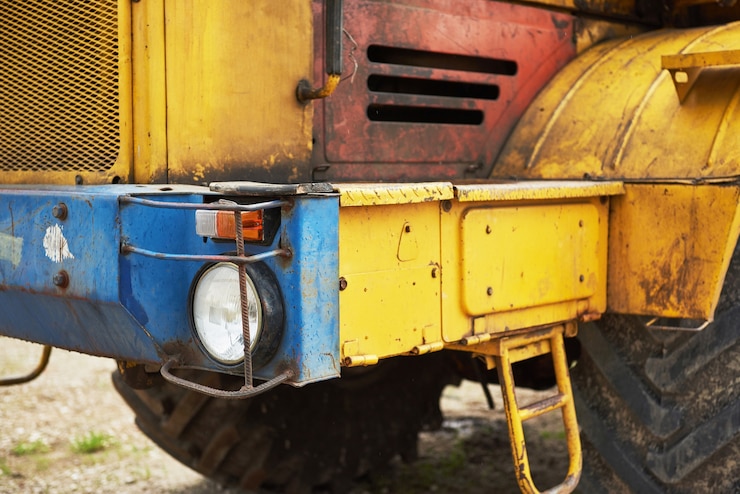 Foto gratuito bulldozer del caricatore della costruzione pesante all'area di costruzione.