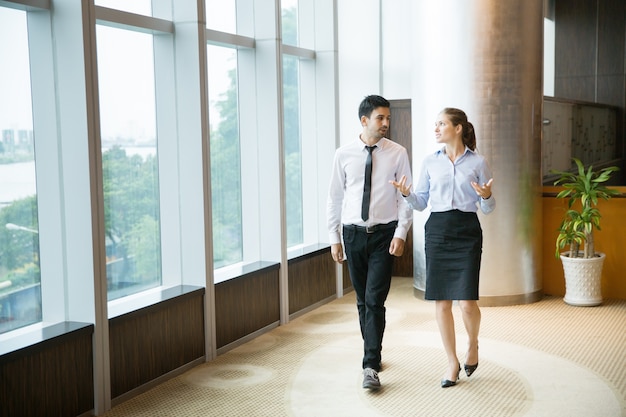 Business People Walking in Office 1