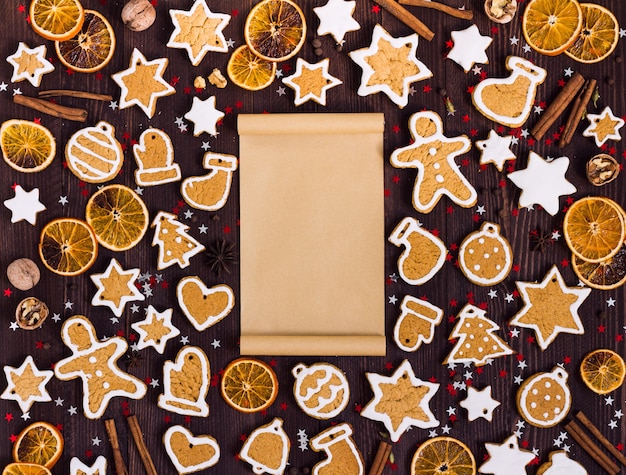 Carta vuota di natale dei biscotti del pan di zenzero per la cannella delle arance del nuovo anno di ricetta
