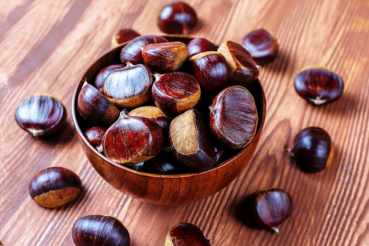 Foto gratuito castagne biologiche fresche.
