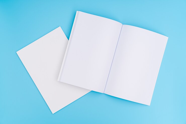 Foto gratuito catalogo in bianco, riviste, libro mock up su sfondo blu. .