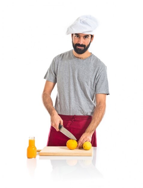 Chef facendo succo d&#39;arancia