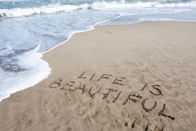 Citazione ispiratrice sulla spiaggia