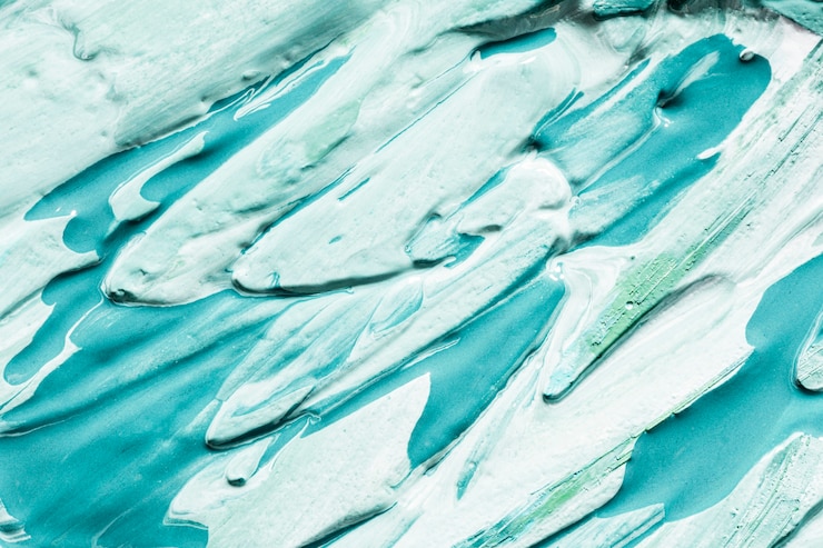 Foto gratuito close-up di pennellate di vernice blu sulla superficie