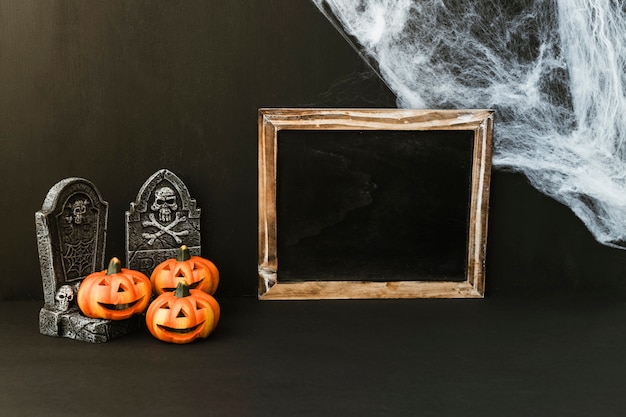 Composizione di ardesia di Halloween con cobweb