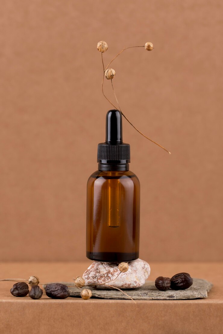 Foto gratuito composizione per il trattamento dell'olio di jojoba