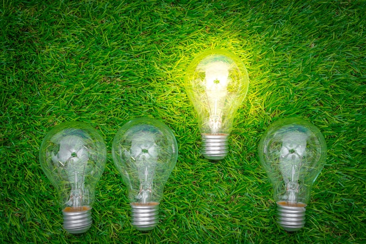 Foto gratuito concetto di eco - lampadina crescere l'erba