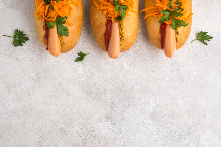 Foto gratuito cornice di hot dog vista dall'alto con copia-spazio