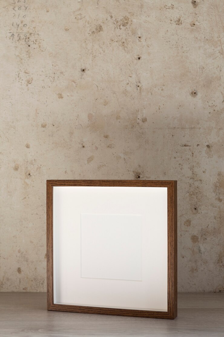 Foto gratuito cornice in legno vuota ad alto angolo