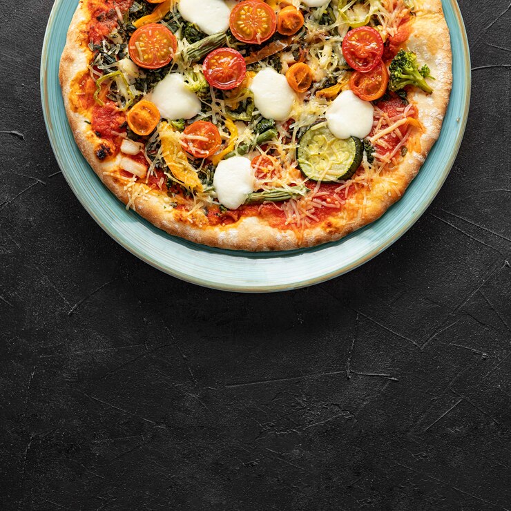 Foto gratuito deliziosa pizza sul piatto