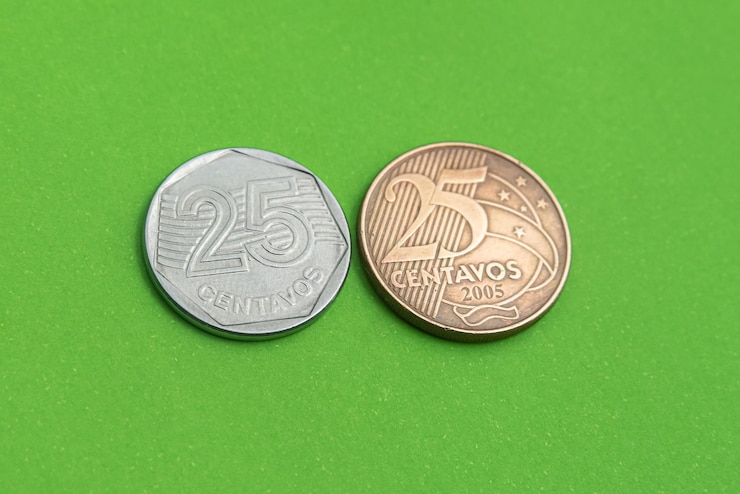 Foto gratuito denaro - monete brasiliane - 25 centavos