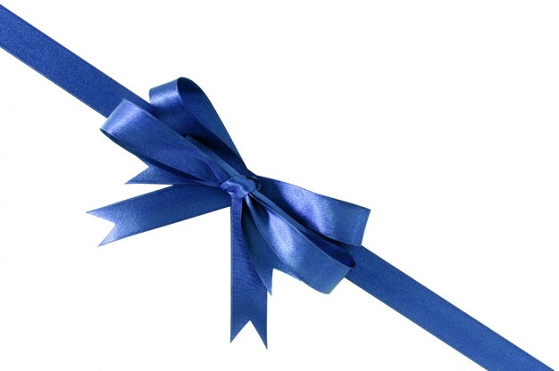 Diagonale dell&#39;angolo dell&#39;arco del nastro del regalo del blu reale profondo isolata su bianco.