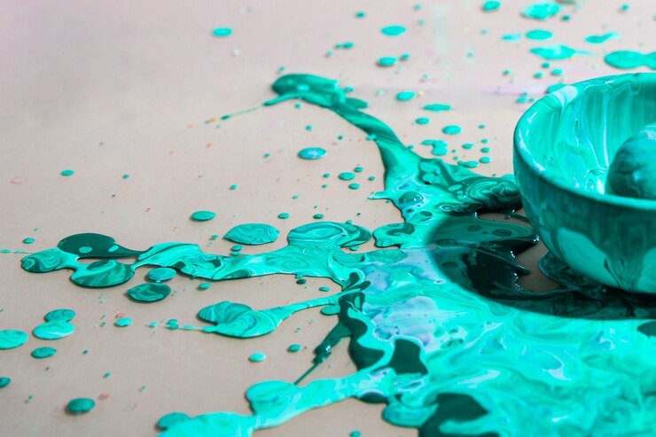 Foto gratuito disposizione con spruzzi di vernice verde