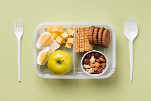 Disposizione della scatola di cibo sano piatta